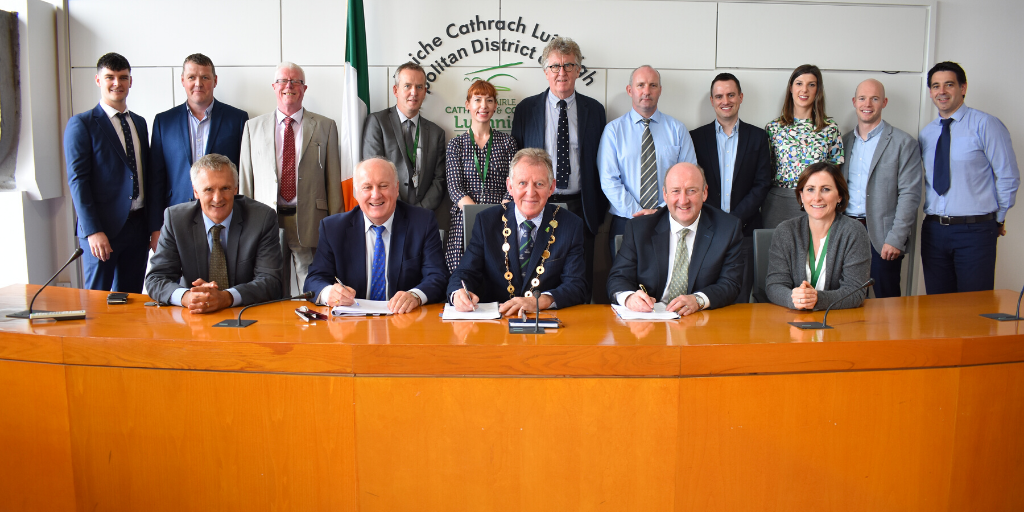 Glenman Corporation director Albert Conneally (front row second left) pictured with Mayor of Limerick Michael Sheahan at the signing of contracts for a new social housing development in Clonmacken, Limerick. Photo courtesy of Limerick City and County Council. Glenman Corporation director Albert Conneally (front row second left) pictured with Mayor of Limerick Michael Sheahan at the signing of contracts for a new social housing development in Clonmacken, Limerick. Photo courtesy of Limerick City and County Council.